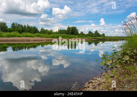 View of the Kiya River on a windless summer day, Kemerovo region-Kuzbass Stock Photo