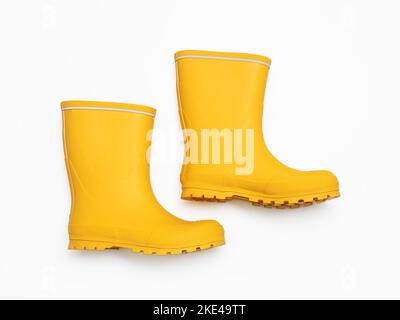 Yellow rubber boots isolated on white Stock Photo