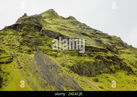 Slope of volcanic mountains near Skogafoss waterfall  Stock Photo