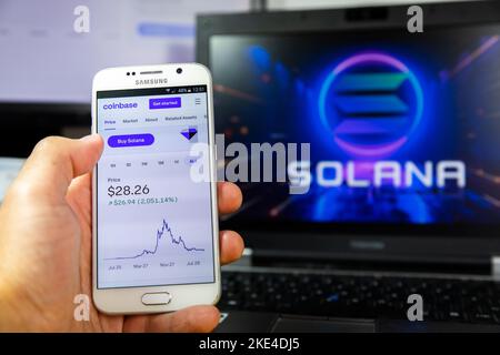 Belgrade, Serbia - November 08, 2022: Buy Solana Cryptocurrency at Coinbase crypto currency marketplace via android smarphon.Solana is a public blockc Stock Photo