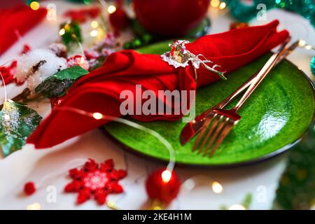 Traditional Christmas table place setting. Stock Photo