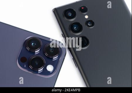 New york, USA - November 8, 2022: Big cameras Apple iphone 14 pro max and samsung Galaxy s22 ultra  smartphone close up view Stock Photo