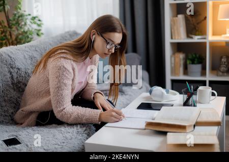 Woman studying at home Stock Photo