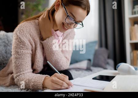 Student with books at home Stock Photo