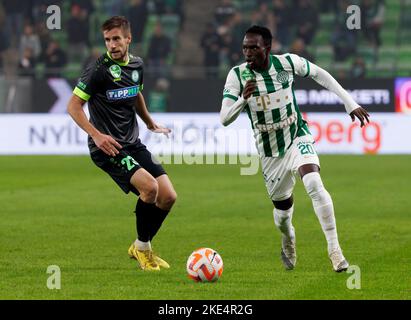 Budapest, Hungary. 31st August, 2023. Barnabas Varga of Ferencvarosi TC  competes for the ball with Nassim Hnid of FK Zalgiris Vilnius during the  UEFA Europa Conference League Play Off Round Second Leg