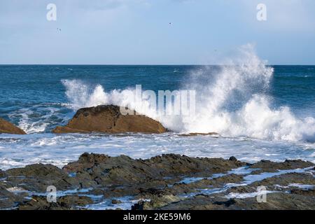 Waves breaking on rocks at Prawle Point, East Prawle, Devon Stock Photo