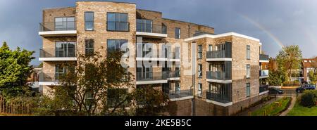 A beautiful rainbow over The Hill Group's newly built residential flats in London. Stock Photo
