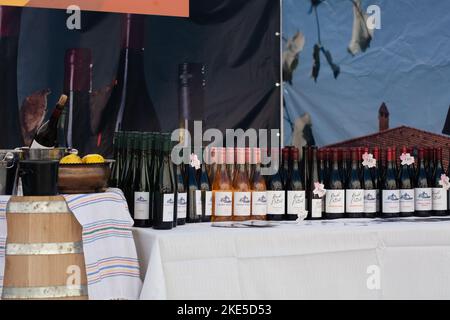 Chisinau, Moldova - October 15, 2022: Open-air wine exhibition during the Chisinau City Day celebration. Moldova wines. Selective focus Stock Photo