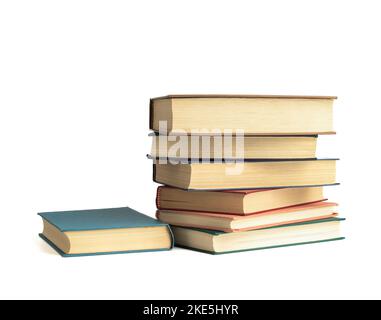 Several hardcover books isolated on a white background. Copy space. Stock Photo
