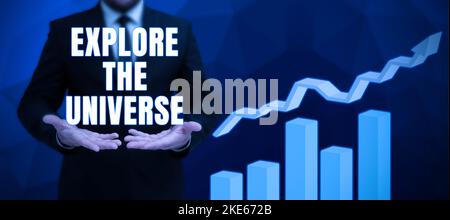 Hand writing sign Explore The Universe. Word for Space and Scientific discovery of the galaxies Stock Photo