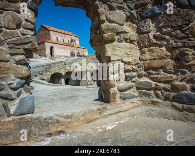 A view of the basilica through a passageway at the ancient Uplistsikhe cave town in Georgia Stock Photo