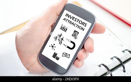 Investors attraction concept shown on a smartphone screen Stock Photo