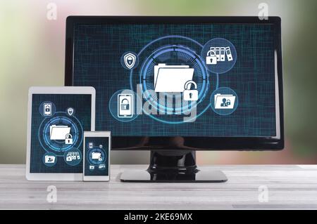 Confidential data concept shown on different information technology devices Stock Photo