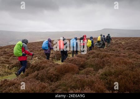 Walkers in the hills above Crickhowell, Wales, during the annual Crickhowell Walking Festival. Stock Photo