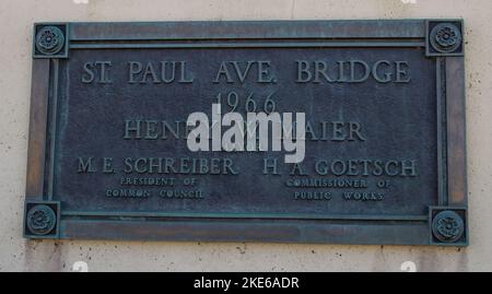 Milwaukee, WI, USA April 10 2022: St Paul Ave Bridge plaque sign in downtown Milwaukee, Wisconsin. The bridge was dedicated in 1966. Stock Photo