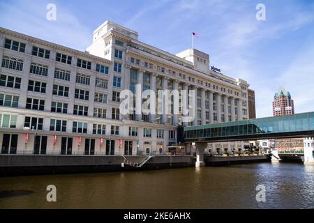 Milwaukee, WI, USA April 10 2022: Residence Inn by Marriott Milwaukee Downtown and Planet Fitness buildings on the river. Stock Photo