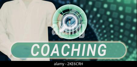 Text showing inspiration Coaching. Business concept unlocking a persons potential to maximize their own performance Stock Photo