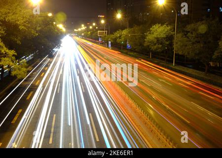 Colorful light trails of north second ring road traffic flow in Beijing, China Stock Photo