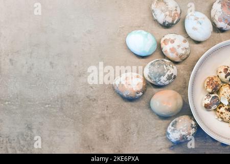blue easter eggs on concrete. Happy Easter card: marble stone effect painted. top view, flat lay Stock Photo