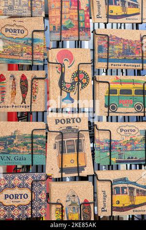 Stand with various local postcards made of cork, traditional material with biodegradable, renewable and recyclable qualities used in souvenirs making Stock Photo