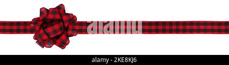 Christmas gift bow and ribbon with red and black buffalo plaid pattern. Long border isolated on a white background. Stock Photo