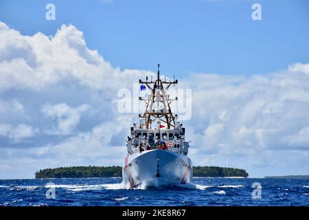 The crew USCGC Oliver Henry (WPC 1140) visit Ulithi Atoll on Oct. 31, 2022, the first time a fast response cutter visited the atoll and delivered 20 boxes of supplies, 50 personal floatation devices, and sporting equipment donated by the cutter crew, the extended U.S. Coast Guard Guam family, Ulithi Falalop Community Action Program, Guam Island Girl Power Foundation, and Ayuda Foundation. Ulithi was a central U.S. staging area during World War II, and home to a U.S. Coast Guard Loran-C communications station from 1944 to 1965 before operations relocated to Yap and ultimately shuttered in 1987. Stock Photo