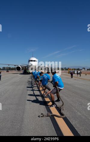 Team pulling a UPS airplane at the Special Olympics of Southern ...