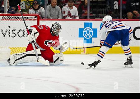 Raleigh, North Carolina, USA. 10th Nov, 2022. Carolina Hurricanes goaltender Pyotr Kochetkov (52) saves a penalty shot taken by Edmonton Oilers left wing Dylan Holloway (55) during a game between the Edmonton Oilers and the Carolina Hurricanes at PNC Arena in Raleigh, NC, on November 10, 2022. (Credit Image: © Spencer Lee/ZUMA Press Wire) Stock Photo