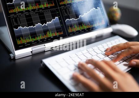 Stock Broker Exchange Trading App On Laptop Stock Photo