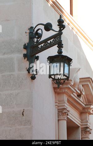 Wrought iron lamp in old town Alcudia Spain Stock Photo