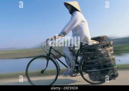 Cyclist, nr Hue, Vietnam Stock Photo