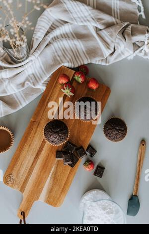 Cupcakes on wooden board Stock Photo