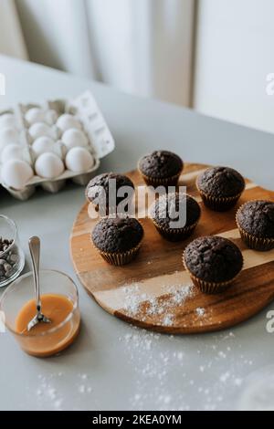 Cupcakes on wooden board Stock Photo