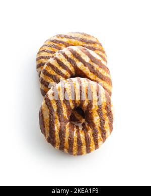 Donuts with chocolate and caramel icing isolated on the white background. Stock Photo