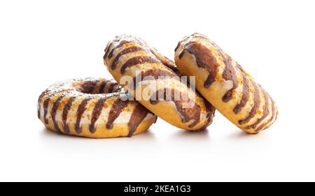 Donuts with chocolate and caramel icing isolated on the white background. Stock Photo