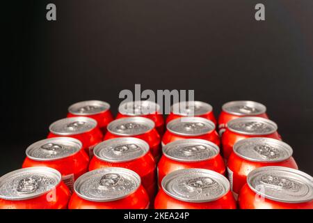 group of fresh beer cans with drops of water with black background Stock Photo