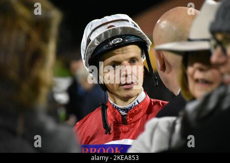 Chelmsford, UK. 11th Nov 2022.David Probert meets connections of One For The Frog in the paddock ahead of the 6.30 at Chelmsford City Racecourse, UK. Credit: Paul Blake/Alamy Live News. - Image ID: 2JPTWMA Stock Photo