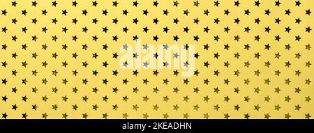 Golden background from metal foil paper with a pattern of sparkling stars closeup. Texture of yellow metallized wrapping holiday paper surface. Stock Photo