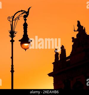 Old Berlin gas lanterns in the street Unter den Linden at sunset at the German Historical Museum, Germany, Berlin Stock Photo