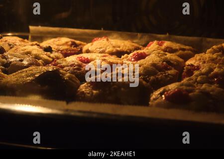 fresh muffins baked in the oven Stock Photo