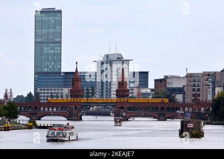 Spree with Oberbaum Bridge and Treptowers high-rise building, Germany, Berlin Stock Photo