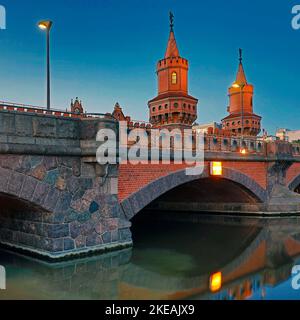 Oberbaum Bridge, double-deck bridge crossing Berlin's River Spree in the early morning, Friedrichshain-Kreuzberg district, Germany, Berlin Stock Photo