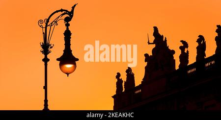 Old Berlin gas lanterns in the street Unter den Linden at sunset at the German Historical Museum, Germany, Berlin Stock Photo