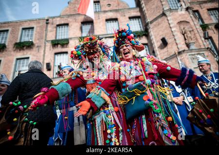 Duesseldorf, Germany. 11th Nov, 2022. Carnivalists celebrate on the market square in front of the city hall. The 'Hoppeditz Awakening' at 11:11 a.m. marks the start of the carnival season in Düsseldorf. The motto of the 2022 carnival season is 'Düsseldorf Helau - We celebrate life. Credit: Fabian Strauch/dpa/Alamy Live News Stock Photo