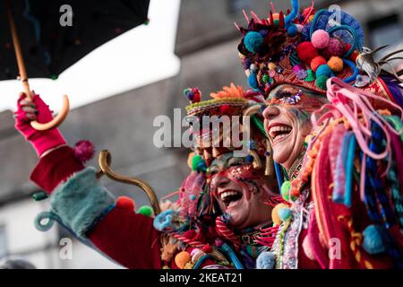 Duesseldorf, Germany. 11th Nov, 2022. Carnivalists celebrate on the market square in front of the city hall. The 'Hoppeditz Awakening' at 11:11 a.m. marks the start of the carnival season in Düsseldorf. The motto of the 2022 carnival season is 'Düsseldorf Helau - We celebrate life. Credit: Fabian Strauch/dpa/Alamy Live News Stock Photo