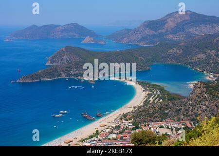 Beautiful mediterranean landscape of sand beach, lagoon, sea and mountains. Oludeniz town aerial view  Stock Photo