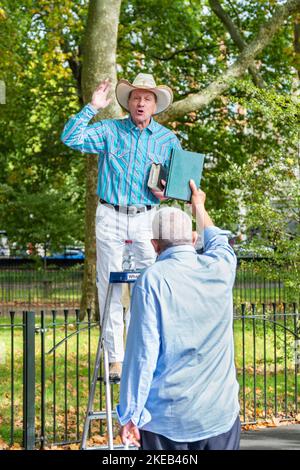 Speaker speaks from a stepladder in Speakers' Corner at Hyde Park. London, England Stock Photo