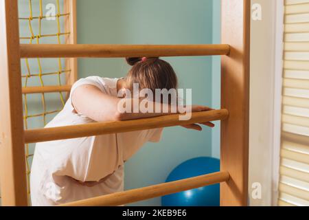 Pregnant woman trying to breath to soothe the pain of her labor contractions Stock Photo