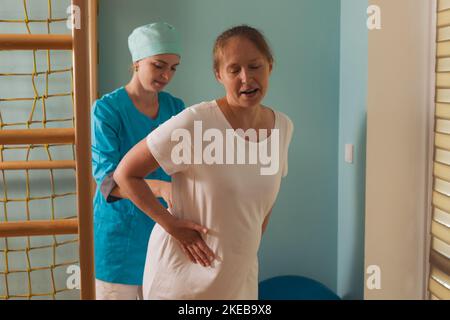 Pregnant woman trying to breath to soothe the pain of her labor contractions Stock Photo