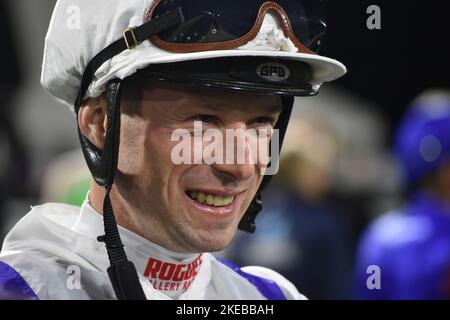 Chelmsford, UK. 11th Nov 2022. Jack Mitchell meets connections of Twilight Heir in the paddock ahead of the delayed 7.30 at Chelmsford City Racecourse, UK. Credit: Paul Blake/Alamy Live News. - Image ID: 2JPTWMA Stock Photo